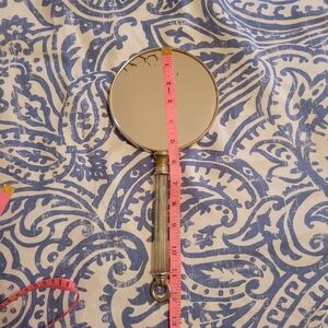 Vintage Handheld Mirror with Ornate Handle